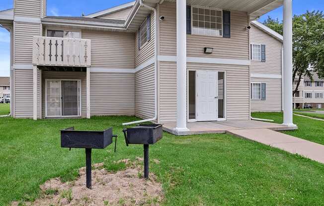 in front of an apartment at sun valley two grilling stations