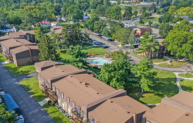 an aerial view of a group of houses in a neighborhood
