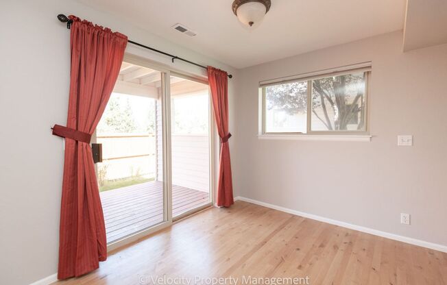 Move in Deposit Reduced! Beautiful Townhome with new paint, carpet and refinished hardwood floors!