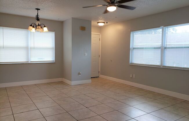 2 BR / 2 BA Condo with Attached Garage and Yard