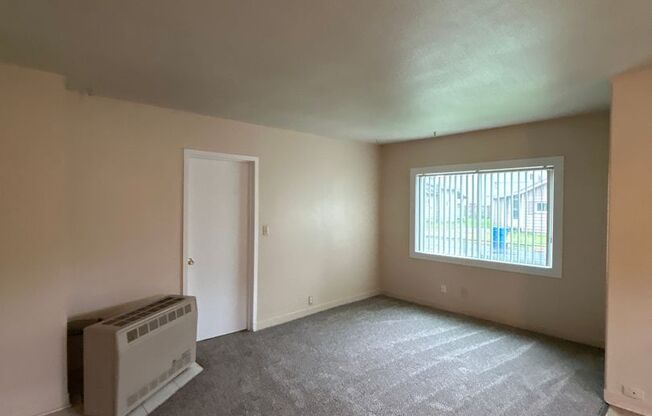 Cute Two Bedroom Home With Detached Car-port!