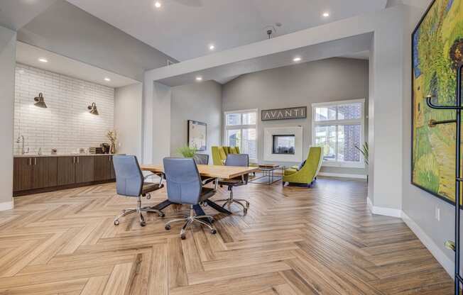 a conference room with a table and chairs and a fireplace