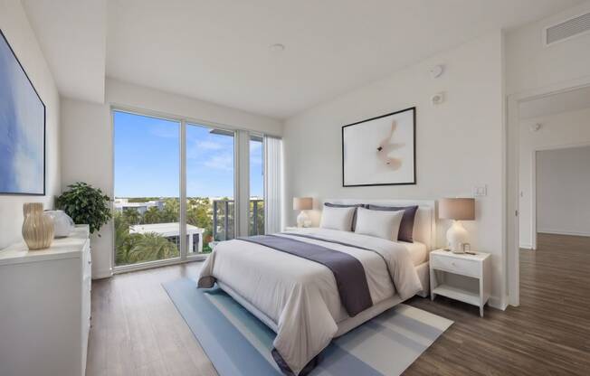 Large bedroom with oversized windows at Allure by Windsor, 33487, FL