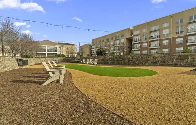 the preserve at ballantyne commons park benches and grass in front of apartment buildings