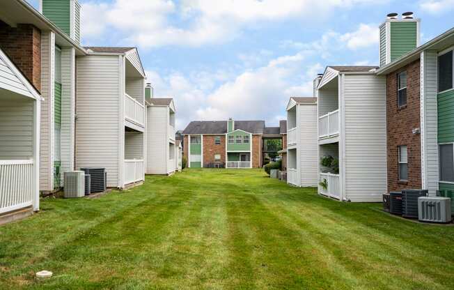 Green Grass Area Between Rivergate Meadows Apartment Homes