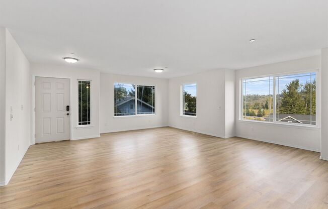 Wide open Eastern views from this near 3,000 sqft house, perched in the trees.