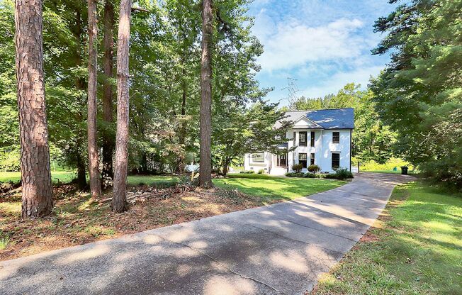 Nestled in a quiet, established Matthews neighborhood, this beautifully updated home sits on a spacious lot, offering both comfort & style.