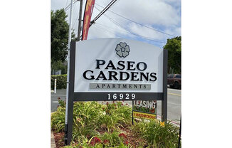 a sign for pasco gardens apartments