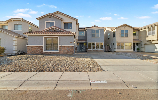 10122 W ALBENIZ PL