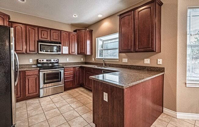 Stunning 5BR Home with Luxury Master Suite & Low-Maintenance Yard!