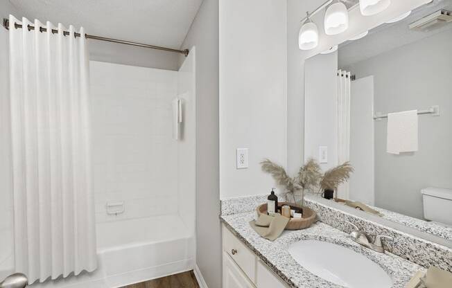 Model bathroom with white vanity