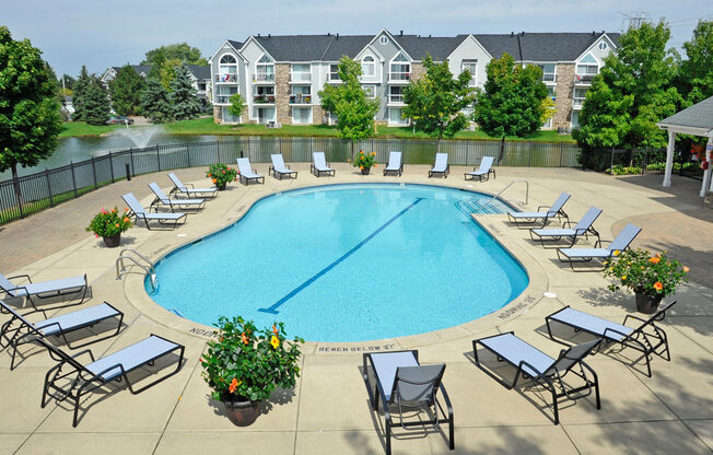 Gated Outdoor Pool and Sundeck at Hillside Apartments, Wixom, Michigan