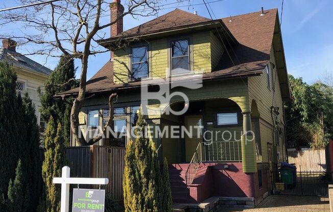 Close-In NE Portland Victorian Offers  Perfect Blend of  Old Charm with New Amenities. Lush Private Yard w/Patio!