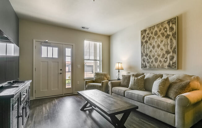 a living room with a couch and a coffee table