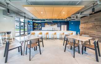 Eat-In Table With High Chairs In Clubhouse at The Baxly, Savannah, GA, 31401