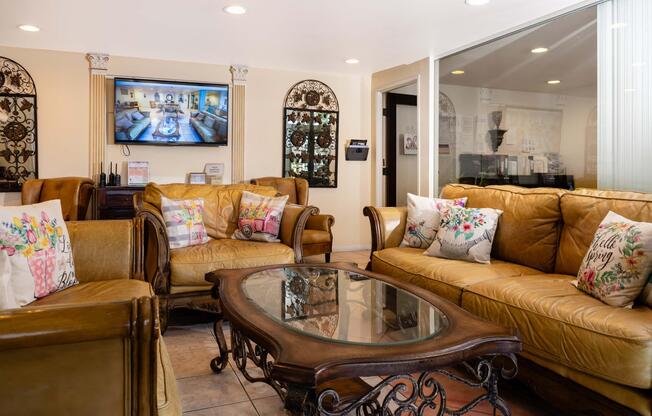 a living room filled with furniture and a fireplace