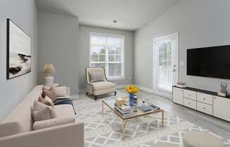 Living room with patio access at The Reserve at Mayfaire Apartments, Wilmington NC