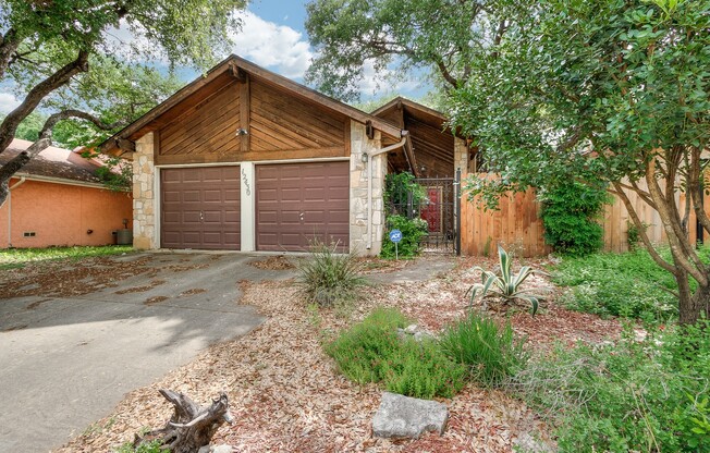 Charming One-Story Home with Mature Oak Trees near UTSA, La Cantera, and The Rim