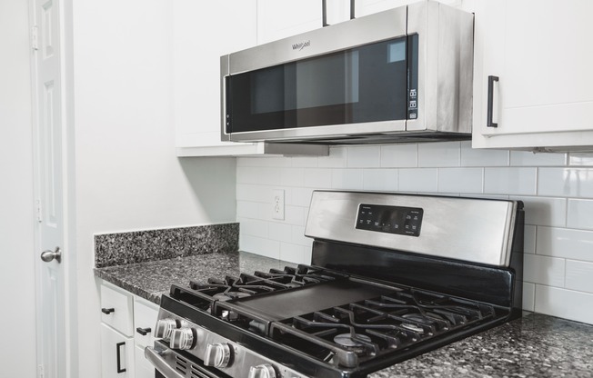 Stainless-steel appliances with granite countertops