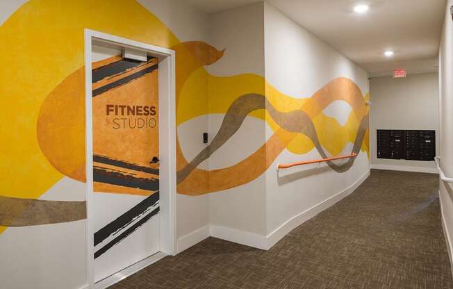 Fitness Center with Cardio, CrossFit & Yoga Components at Echo at North Pointe Center Apartment Homes, Alpharetta, GA 30009