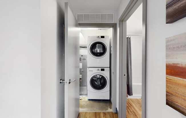 Full-size, front load, stacked washer and dryer is included in every floor plan at Midtown Crossing Apartments Omaha