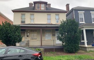 Spacious 1 Bedroom 1/2 Double with Basement & Extra Room