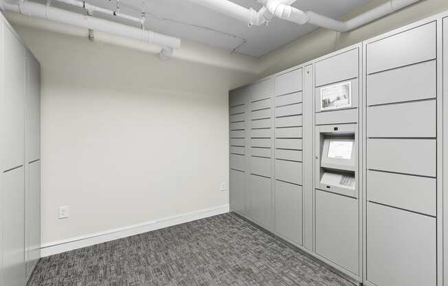 Resident Parcel Receiving Room with Package Lockers and Carpeted Floor at Sir Gallahad Apartment Homes, Washington