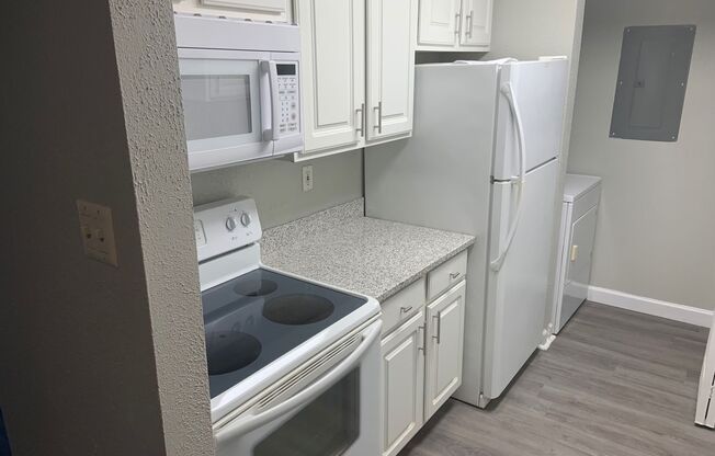 LIKE NEW!!!! Wonderful 2/1 Condo with Fireplace - Available NOW!