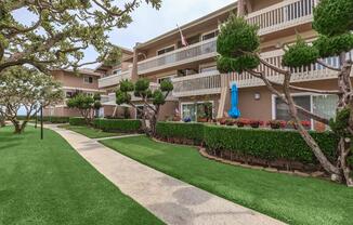 a large lawn in front of a building