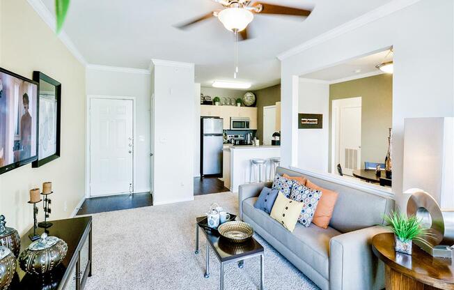 Spacious living rooms with bright windows at Mission at La Villita Apartments in Irving, TX offers 1, 2 & 3 bedroom apartment homes with appliances.
