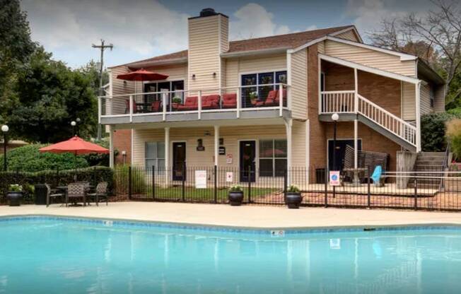 a large swimming pool in front of a house at Landmark at Lyncrest Reserve Apartments, Nashville, 37209
