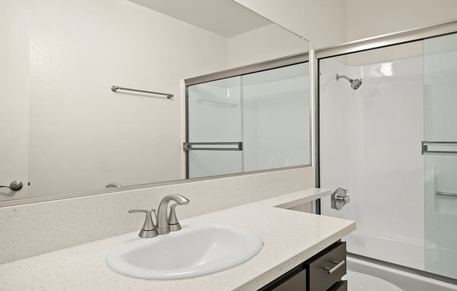 Modern styled bathroom with shower and tub.