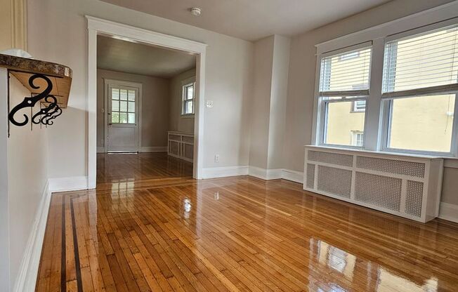HALF MONTH FREE* Single family home with newly refinished hardwood floors throughout, gas fireplace, off-street parking, garage, private yard and unfinished basement!