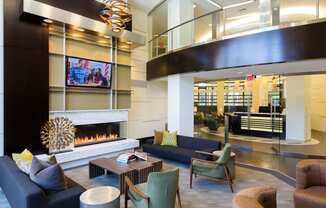 Lobby of Citron with fireplace and TV.