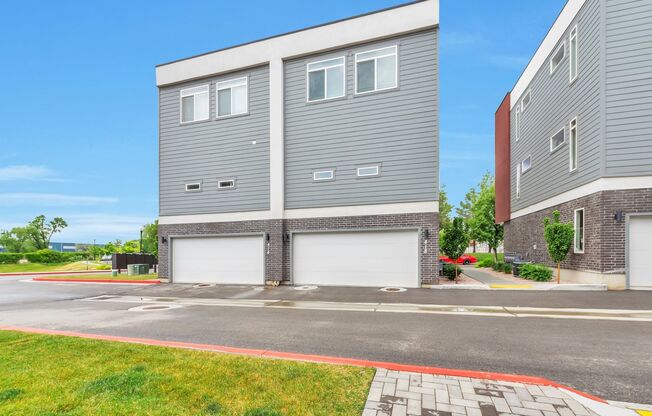 Modern End Unit townhouse w attached 2 car garage!!