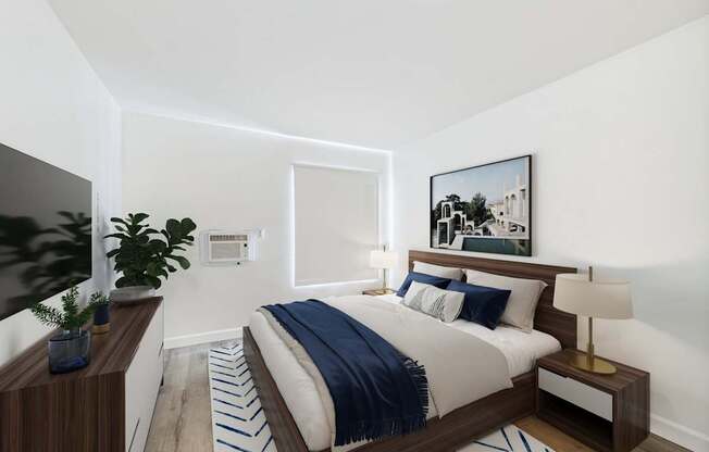 A modern bedroom with a large bed and a painting on the wall.