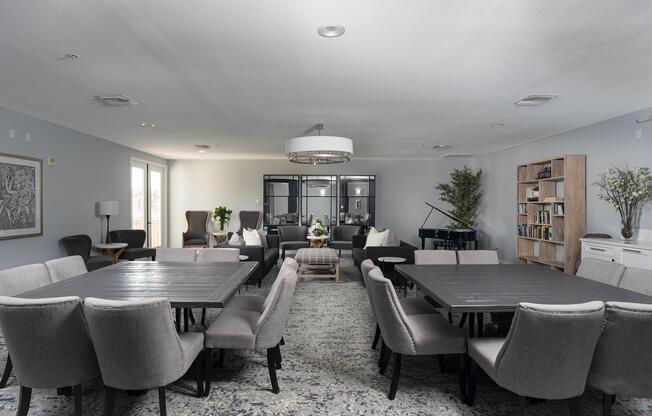 a living room filled with furniture and a table