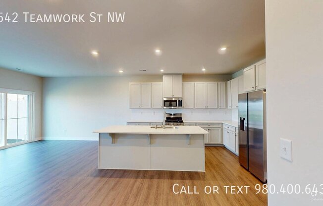 9542 TEAMWORK ST NW