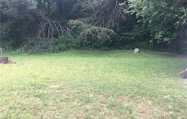 Newly renovated  3 bedroom 1 bath brick ranch home sitting on a large lot and on a quiet street in Gastonia