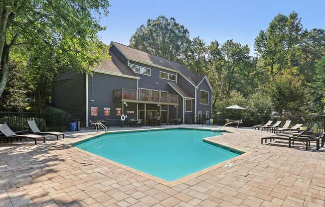 A house with a pool in the backyard.