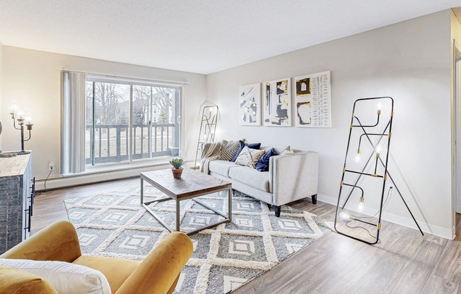 a living room with a couch and a table