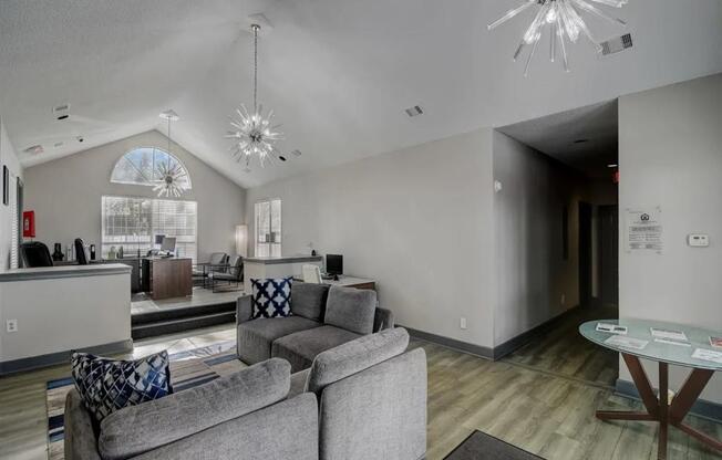 a living room with a couch and a table at The Sapphire, Decatur, GA