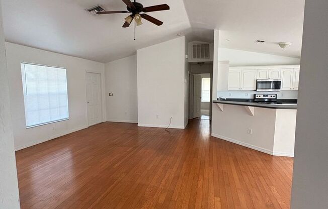 Freshly painted 3 bed 2 bath home w/fenced yard and well service Available NOW!
