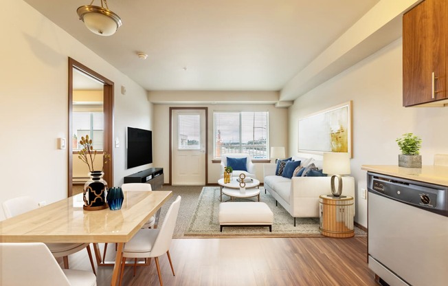 a living room with a couch and a table and a tv