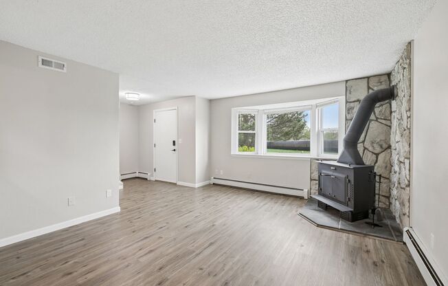 Townhome-Style Living with Greenbelt Views, Attached Garage & Community Pool!
