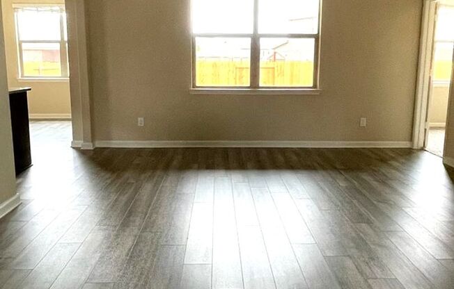 This beautiful one-story home is situated in Lasater Ranch, a sought-after neighborhood in Crowley, Texas.