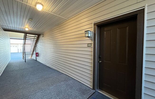 Charming 2 bed 2 bathroom place in Portland! Garage and covered balcony! Washer & Dryer in unit!