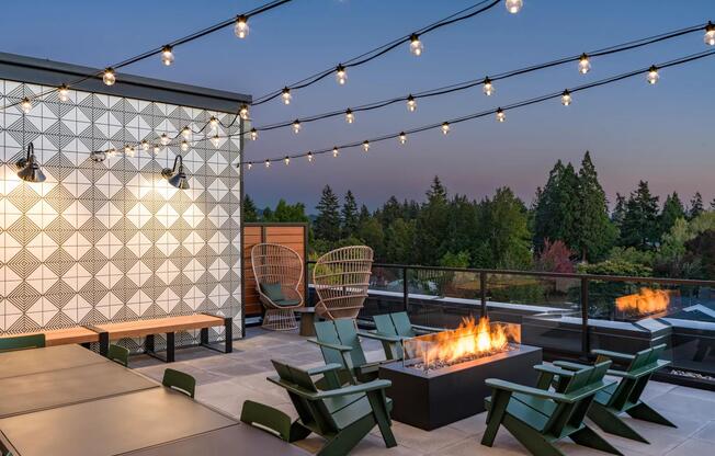 Cozy up at Modera Woodstock's outdoor terrace, complete with a welcoming firepit for year-round gatherings.