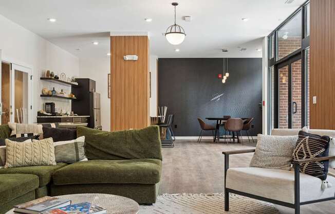A living room with a green couch and a coffee table.