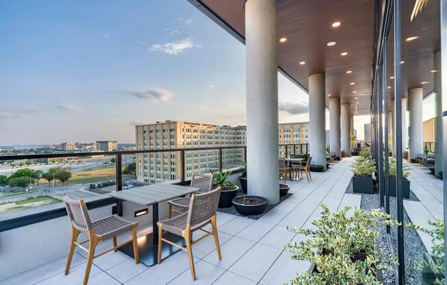 Enjoy Dallas views from outdoor wrap around pool deck at Modera St. Paul, perfect for morning coffee or evening conversations viewing the city.